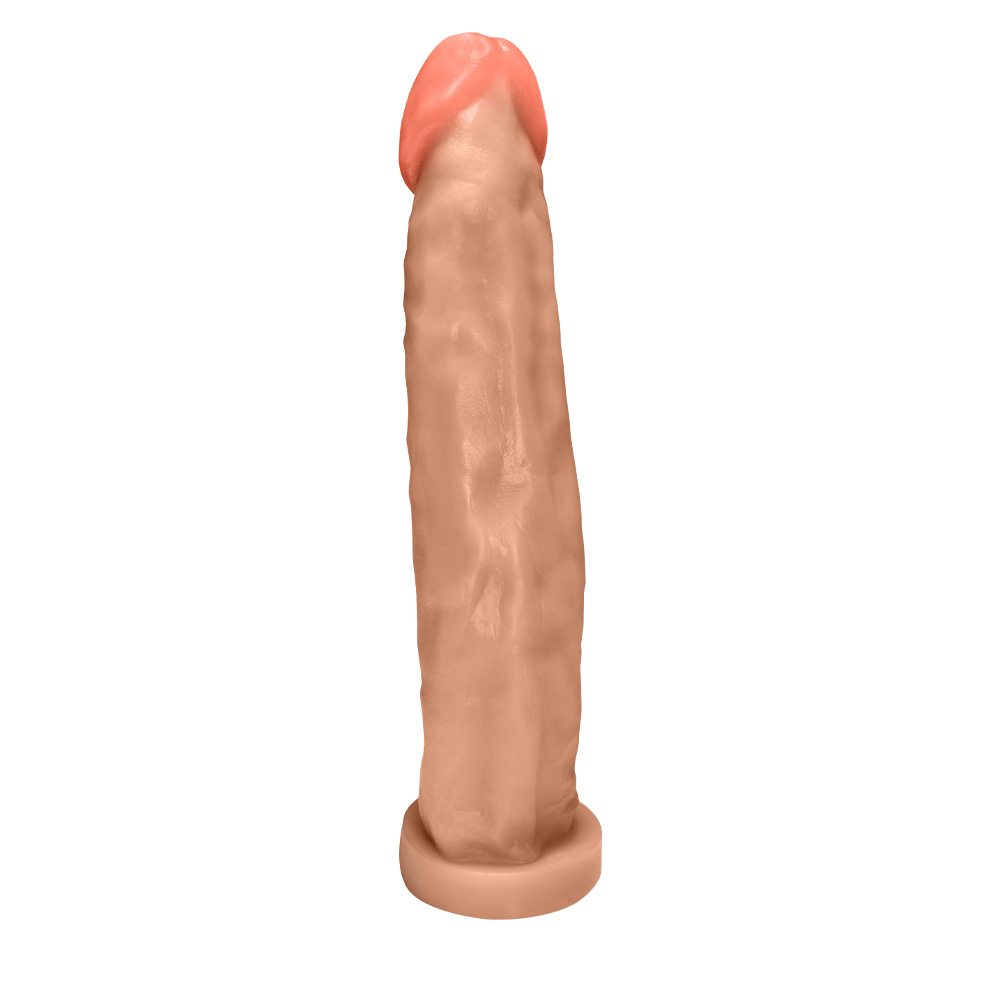 P�nis Gigante e Grosso Flex�vel | Imagem com foco na base enorme, ideal para uso com cinta ou manuseio firme