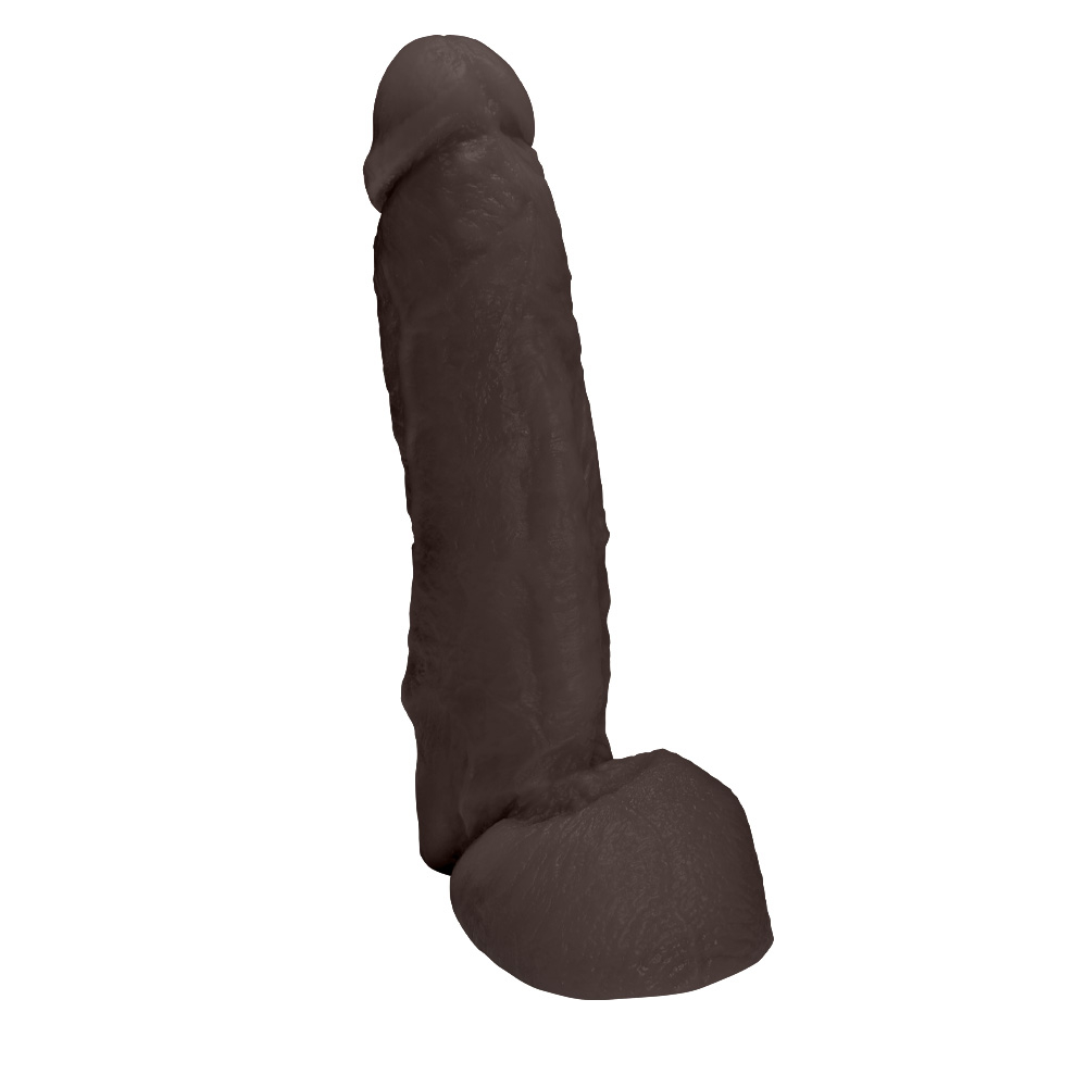 P�nis JeFree em PVC Flex�vel At�xico com Escroto 25 x 6,5cm Marrom em close-up, destacando a cor e a textura do material.