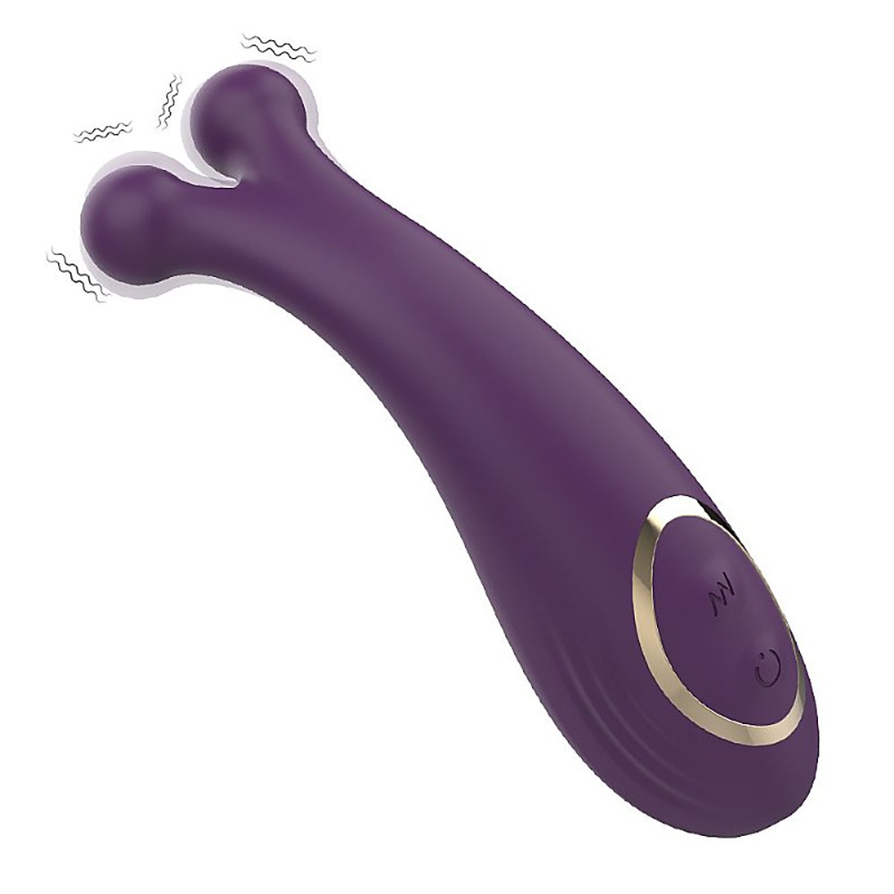Vibrador para Clit�ris Ocean Angel Roxo em uso, destacando as pontas estimulando o clit�ris