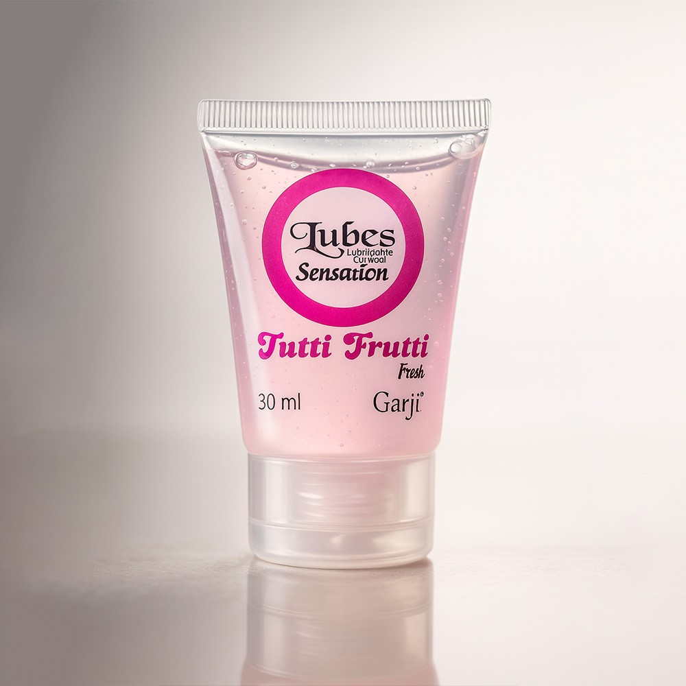 Lubrificante Lubes Sensation TuttiFrutti Fresh 30ml em detalhe, com fundo suavemente desfocado, destacando o produto e seu design.