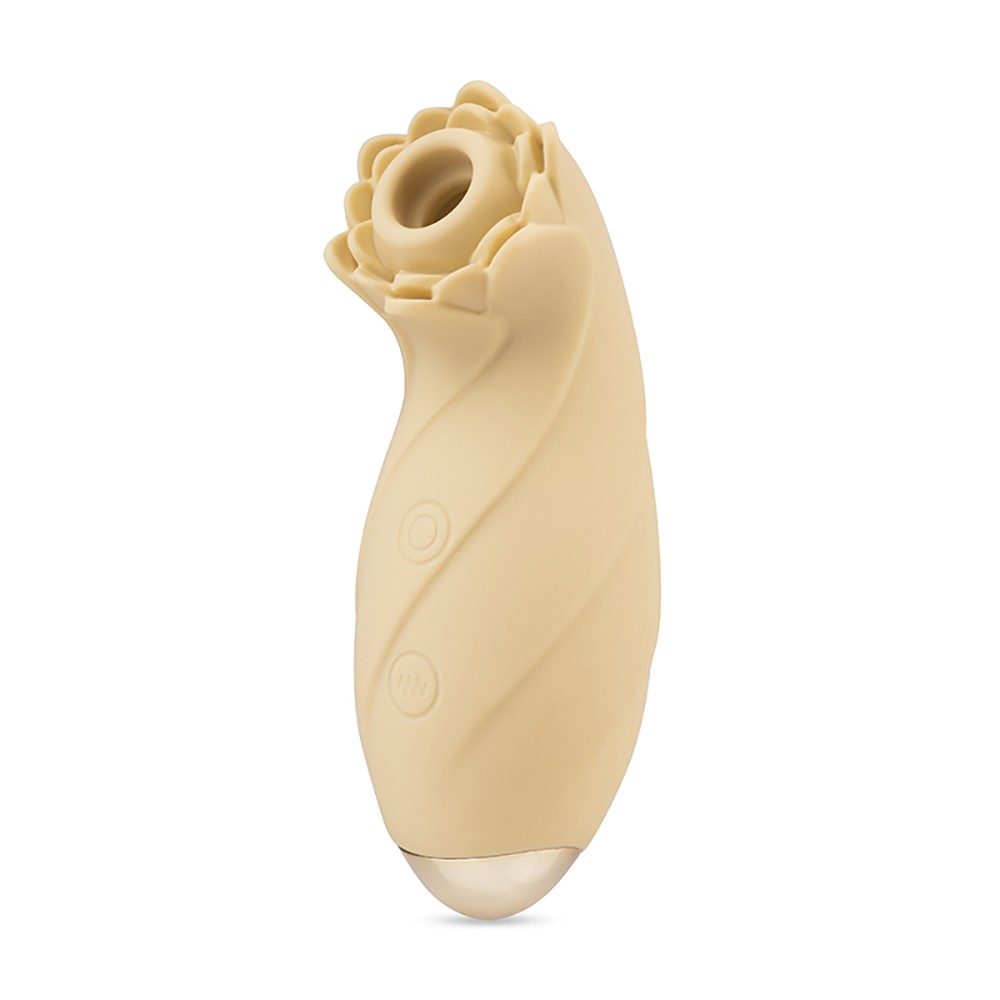 Estimulador de Clit�ris White Lotus, vista lateral completa do estimulador na cor bege, mostrando o corpo em silicone texturizado em ondas e o orif�cio de suc��o no topo