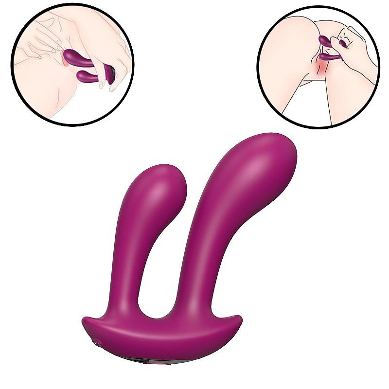 Vibrador duplo de silicone recarreg�vel com 9 vibra��es, na cor pink, mostrando o encaixe para prazer vaginal e anal simult�neo