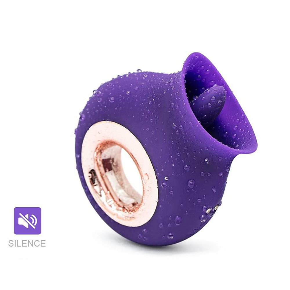 Vibrador para Clit�ris em Silicone Recarreg�vel Roxo - � prova d'�gua mostrando gotas de �gua