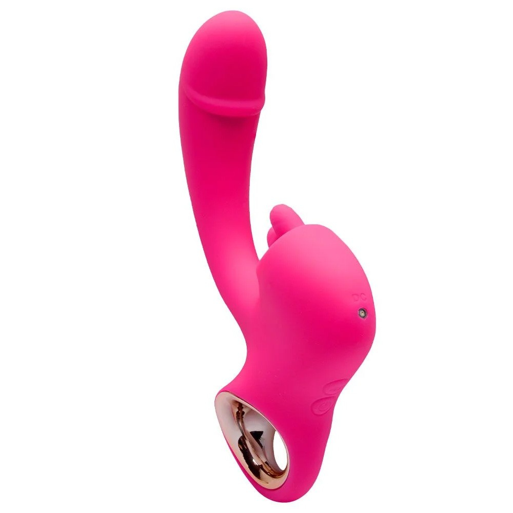 Vibrador Duplo Suri Pink visto de perfil, destacando sua curvatura ergon�mica e silicone macio.