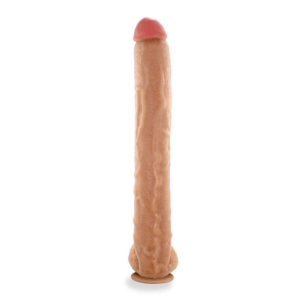 P�nis Gigante e Grosso Flex�vel com Escroto e Ventosa Neg�o da Picona na cor bege, em �ngulo que destaca a parte inferior do dildo e o escroto detalhado