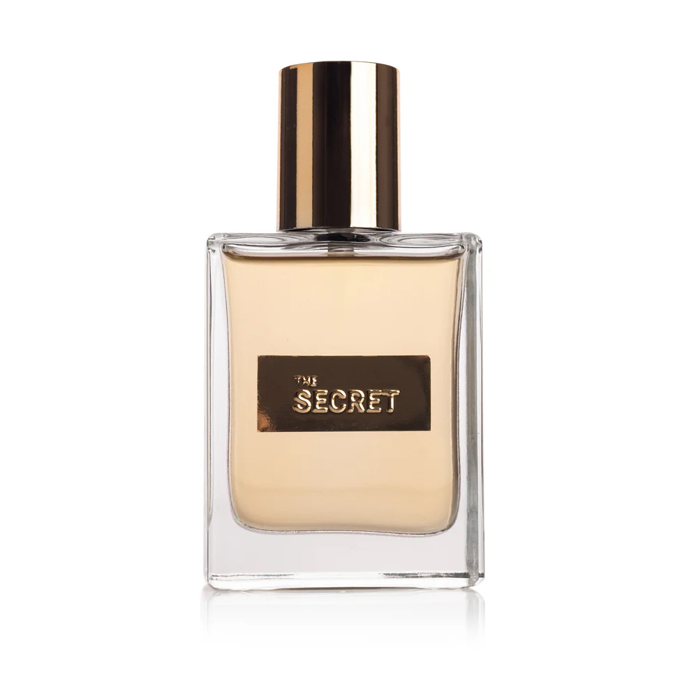 Perfume Feminino Deo Col�nia Afrodis�aca The Secret Gold 50ml, detalhe frontal do frasco com a fragr�ncia