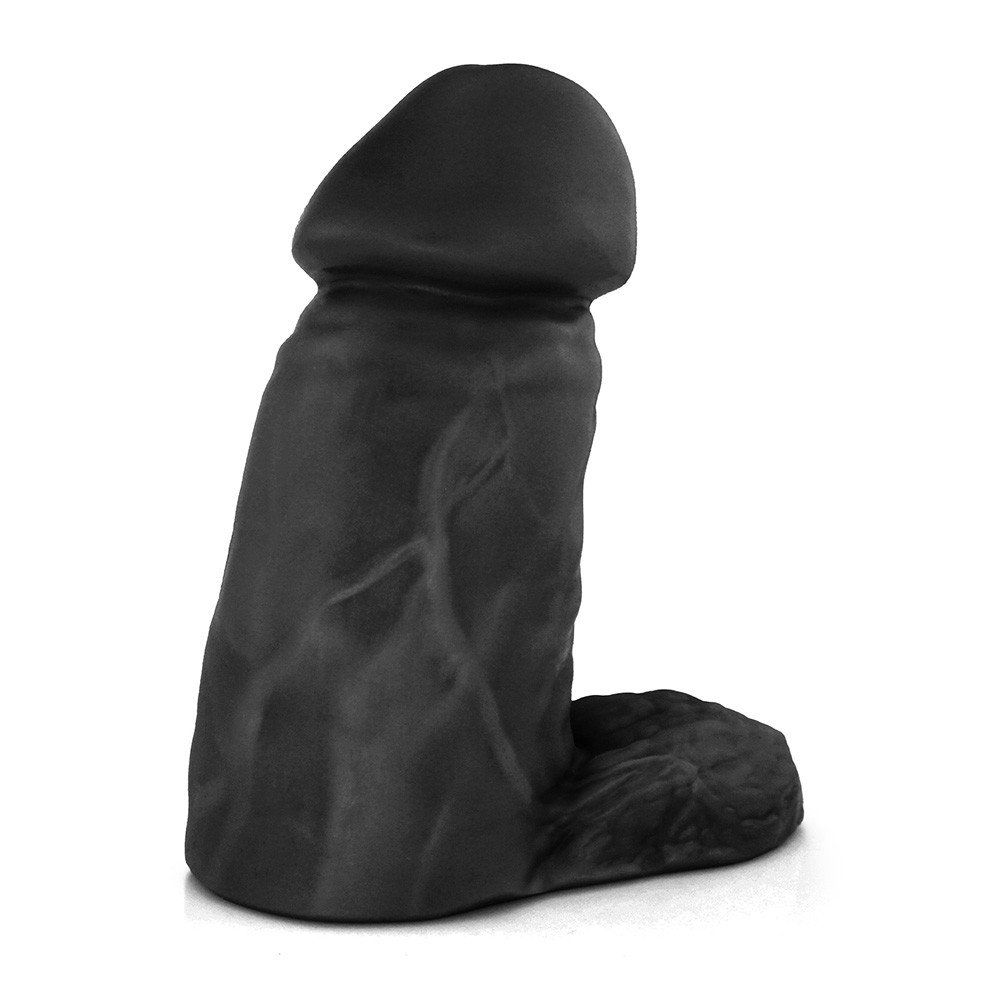 P�nis real�stico flex�vel Massaranduba em vista lateral com foco na base para cinta e textura do material