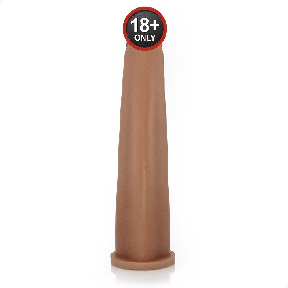 P�nis Gigante e Grosso Flex�vel Comprido 30 x 5,8cm Bege em vista lateral, com foco na flexibilidade do material