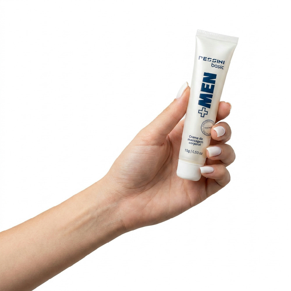 M�o de mulher segurando o tubo do Gel Excitante Masculino Intensificador de Ere��o + MEN 15g, em fundo branco.