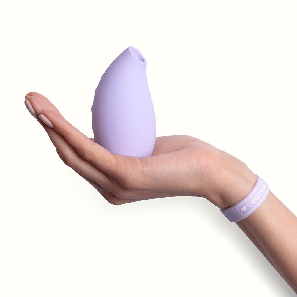 Sugador e Estimulador de Clit�ris em Silicone Recarreg�vel 10 Modos de Ondas de Press�o Xod� Lil�s | Foto 04