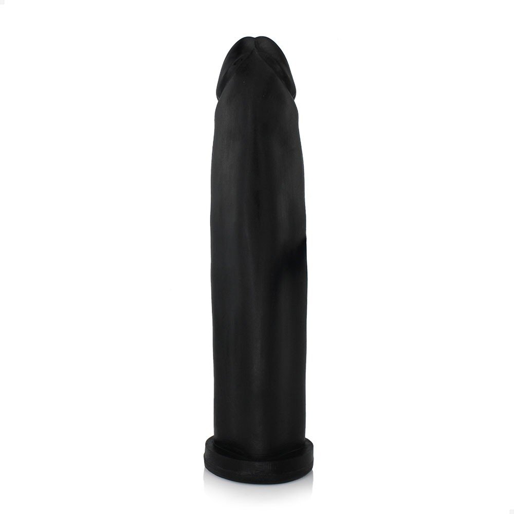 P�nis Gigante e Grosso Flex�vel Fabuloso em detalhe na parte superior, mostrando a glande com seu formato arredondado e contornos lisos. A textura do material PVC Toque Macio � evidente, mas sem veias. A cor preta � uniforme e brilhosa. | Foto 03