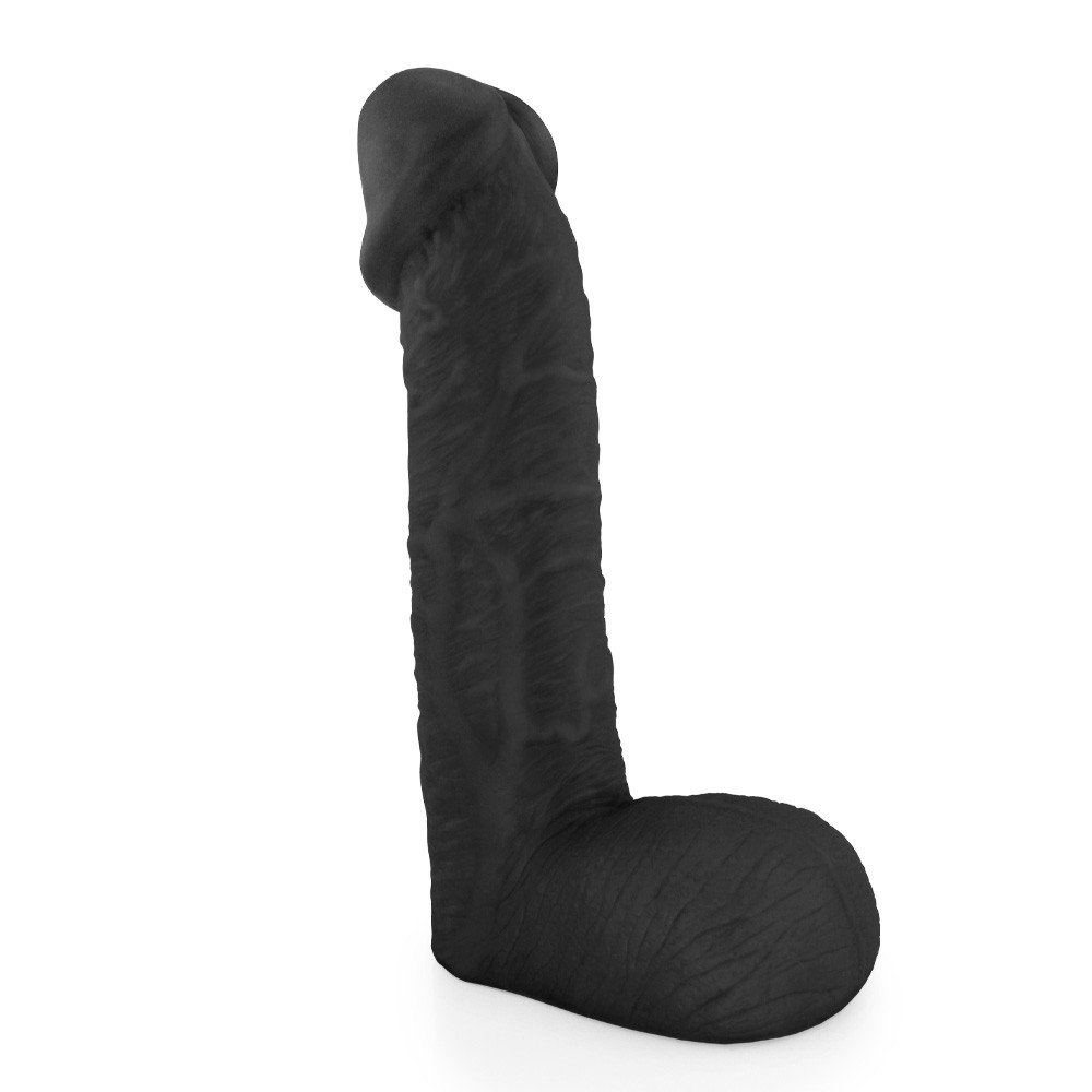 P�nis Real�stico com Escroto Sucuri - Dildo em PVC Flex�vel 27x6,5cm Preto em vista lateral, exibindo o escroto.