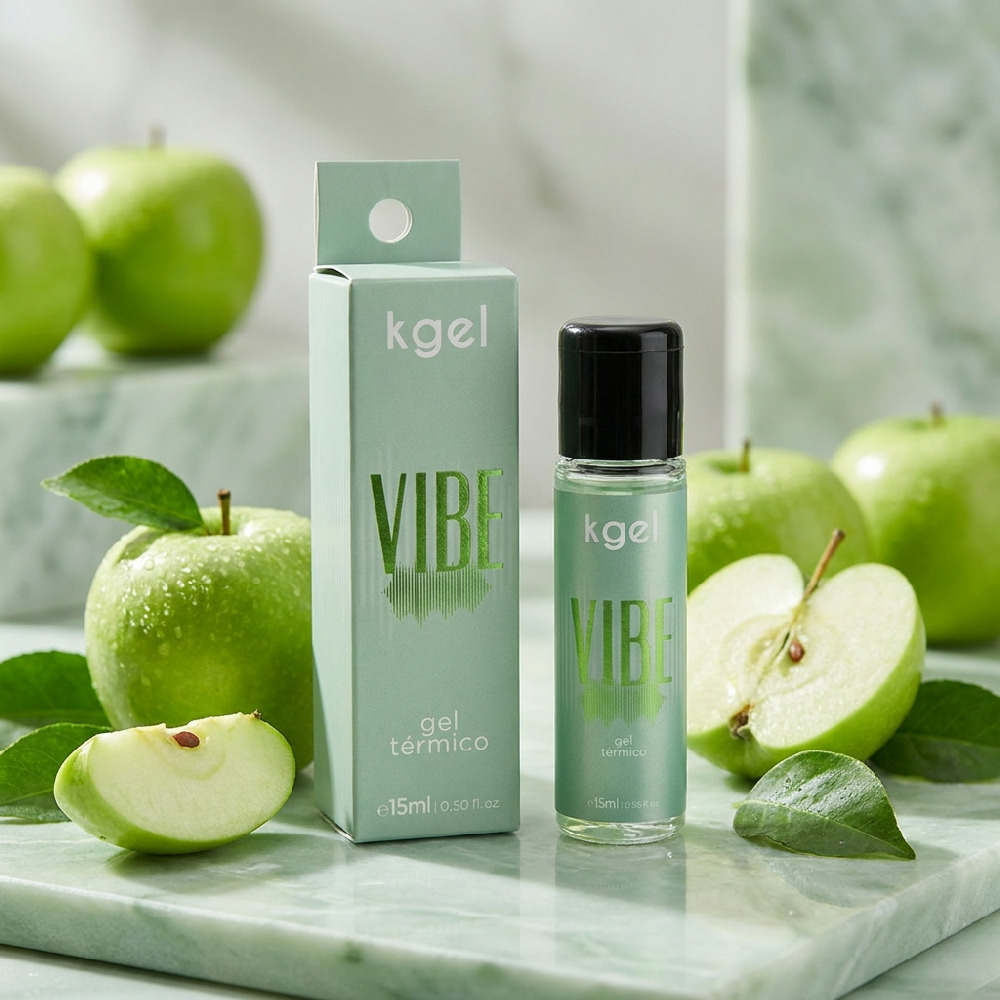 Gel Vibrador L�quido com Aquecimento Vibe Aroma de Ma�� Verde 15ml com ma��s verdes e folhas ao redor, destacando a embalagem e o frasco
